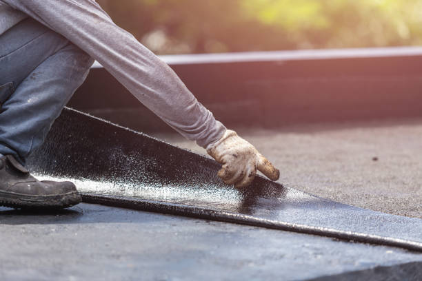 Professional Basement Waterproofing technician working in Glencoe, IL